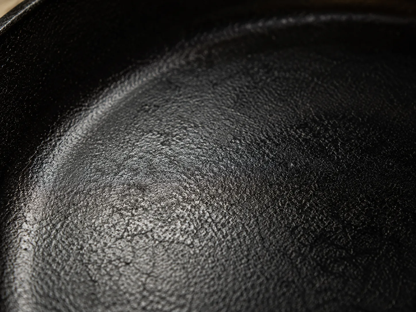 seasoned cast iron cooking surface detail