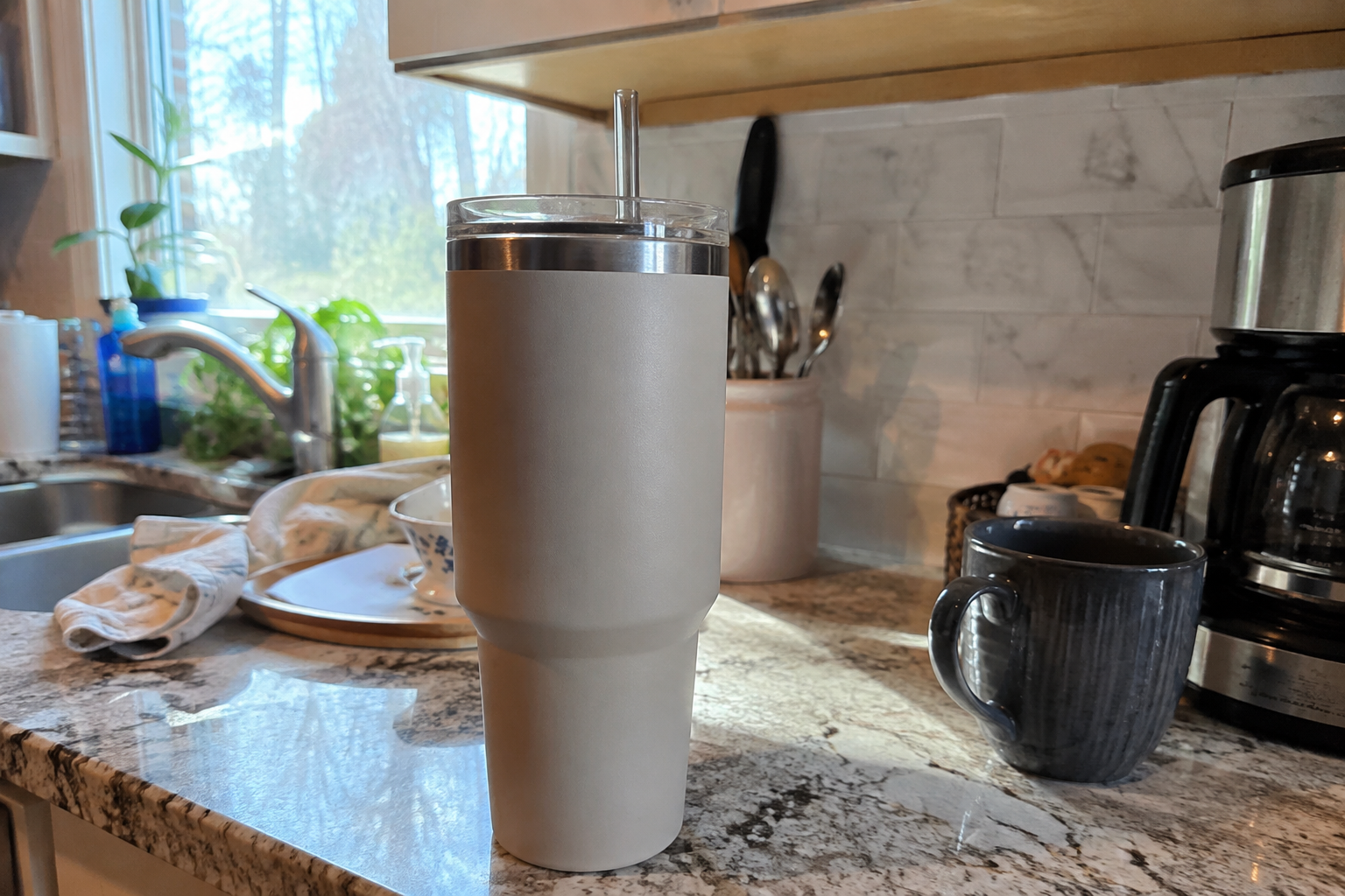 The best insulated water bottles lined up showing different lid styles